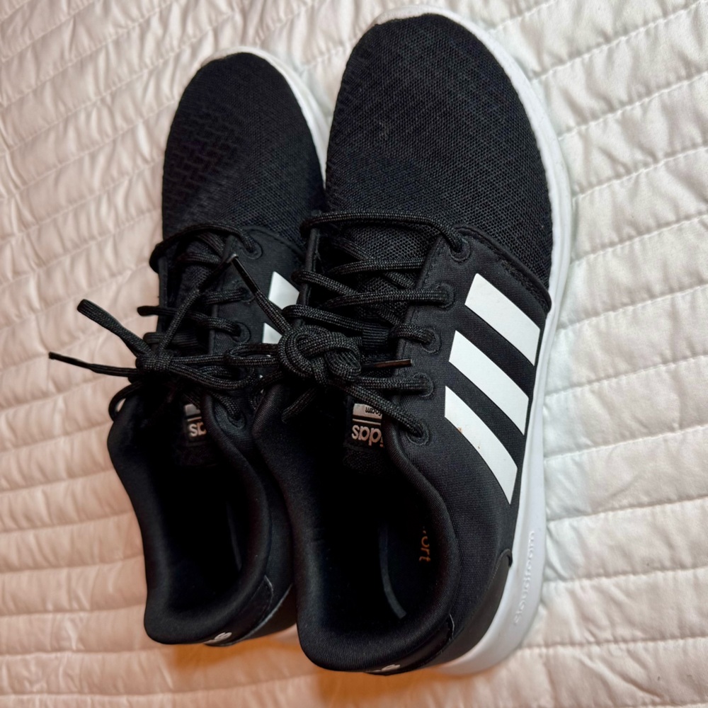 Black and white adidas running shoe